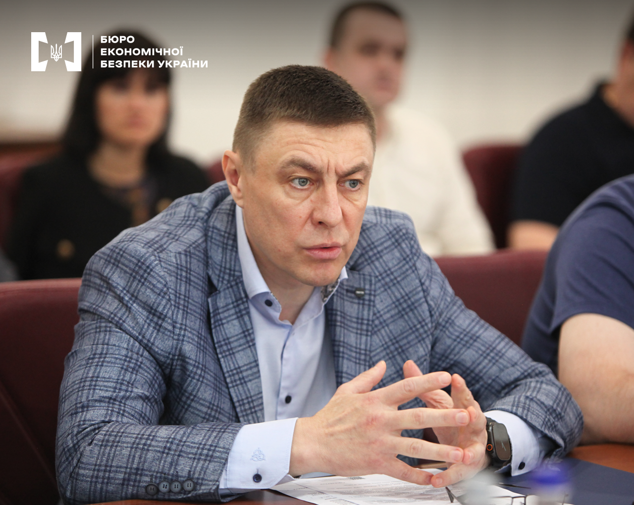 Acting Director of the Economic Security Bureau of Ukraine, Serhii Perkhun, during the meeting. Other participants are also present.