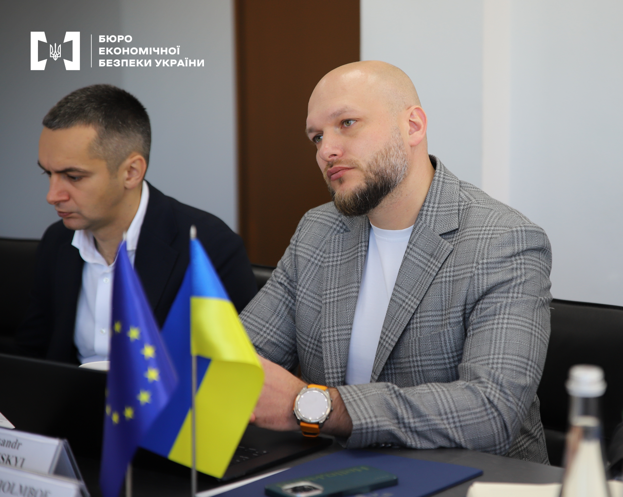 Director of the Economic Security Bureau of Ukraine Oleksandr Tsyvinskyi and his First Deputy Taras Shcherbai at the table during the meeting.