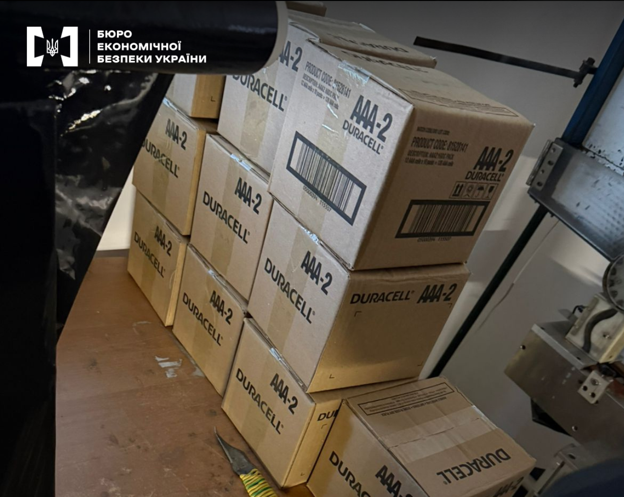 Several boxes labeled with a well-known battery brand on a wooden table