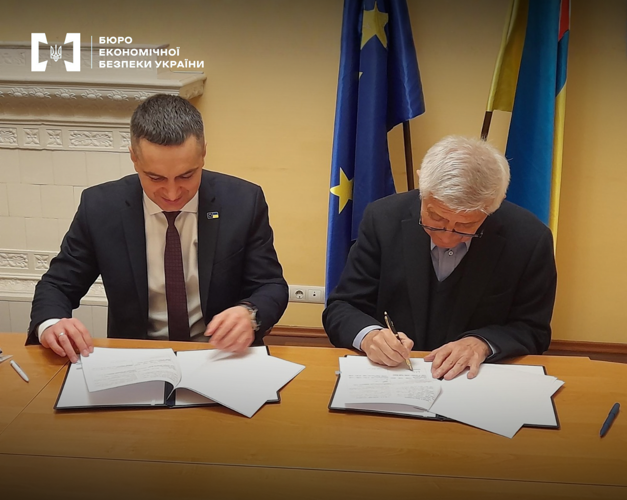 Перший заступник Директора БЕБ Тарас Щербай та представник з Аудиторської ради Ukraine Facility підписують Меморандум