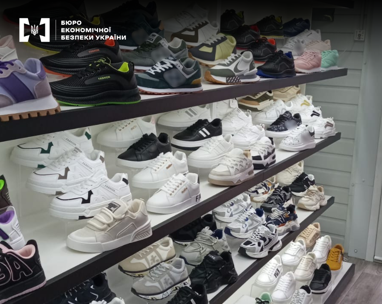 Store shelves lined with numerous pairs of athletic footwear in various models and colors