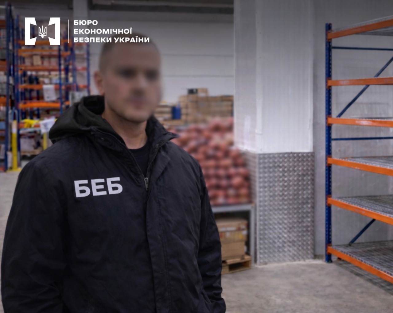 An ESBU detective against the backdrop of a warehouse with storage racks