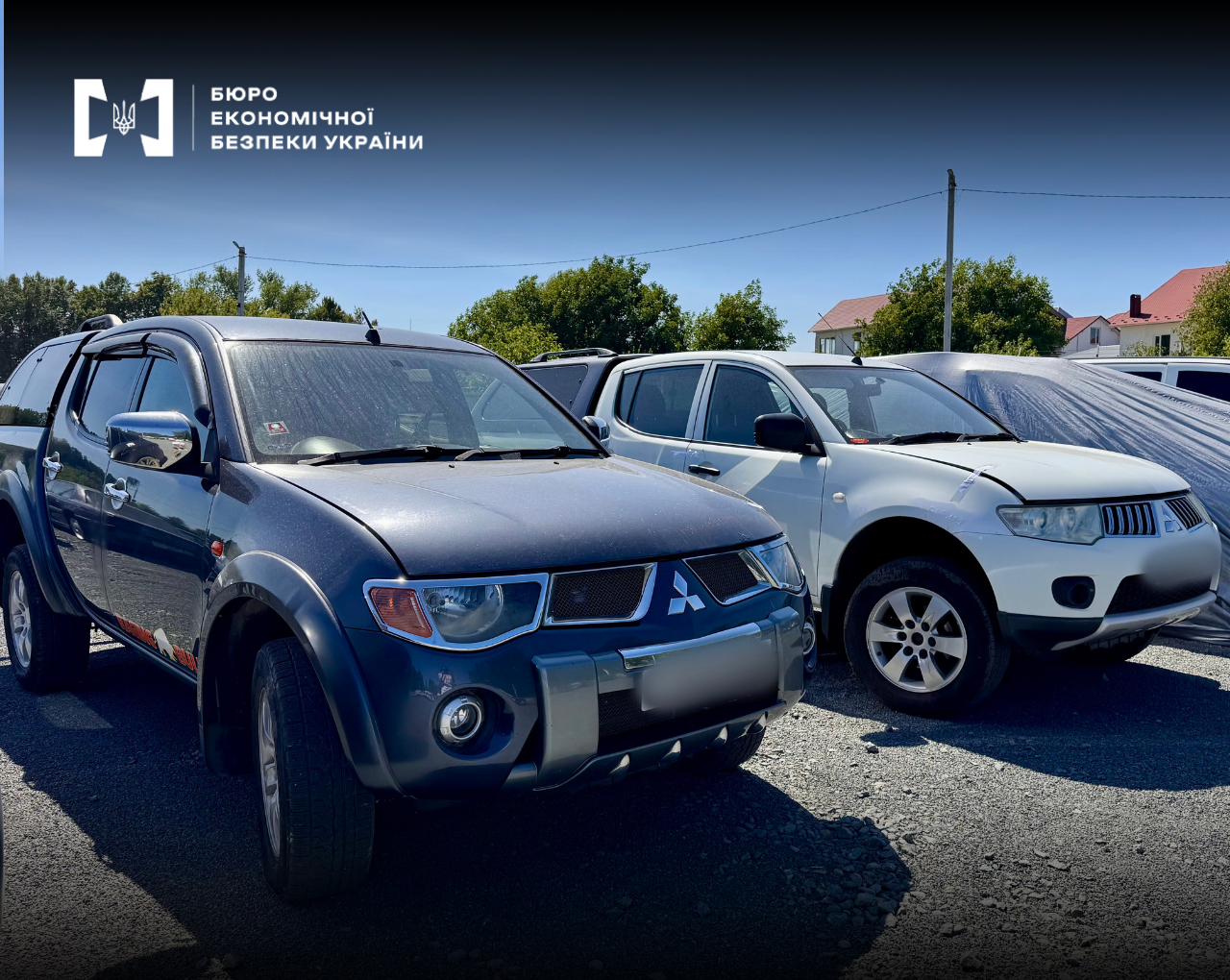 Seized Mitsubishi Triton (L200) cars of the suspects in the case at an impound lot.