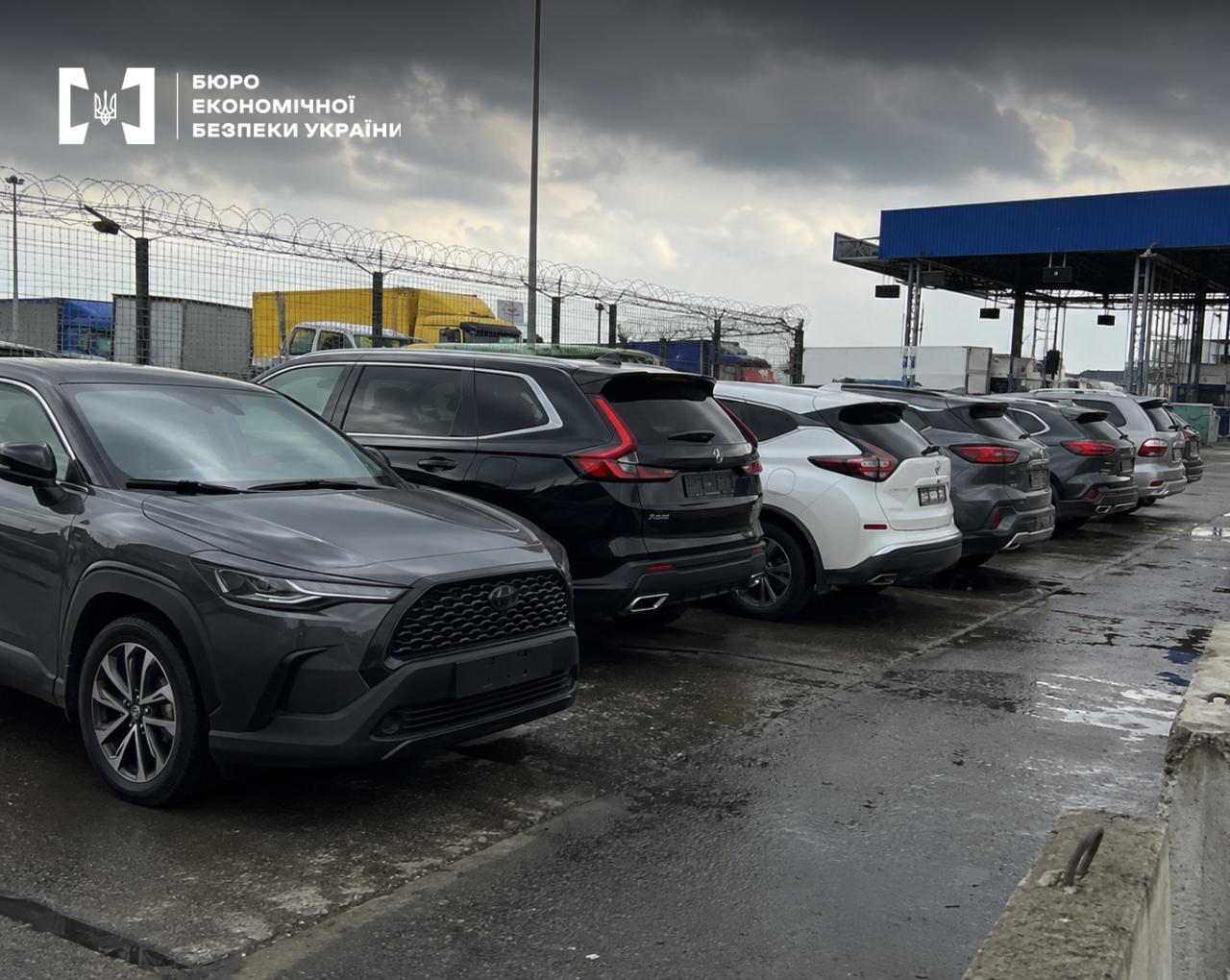 New Toyota Corolla Cross SUVs and other crossovers at a customs terminal.