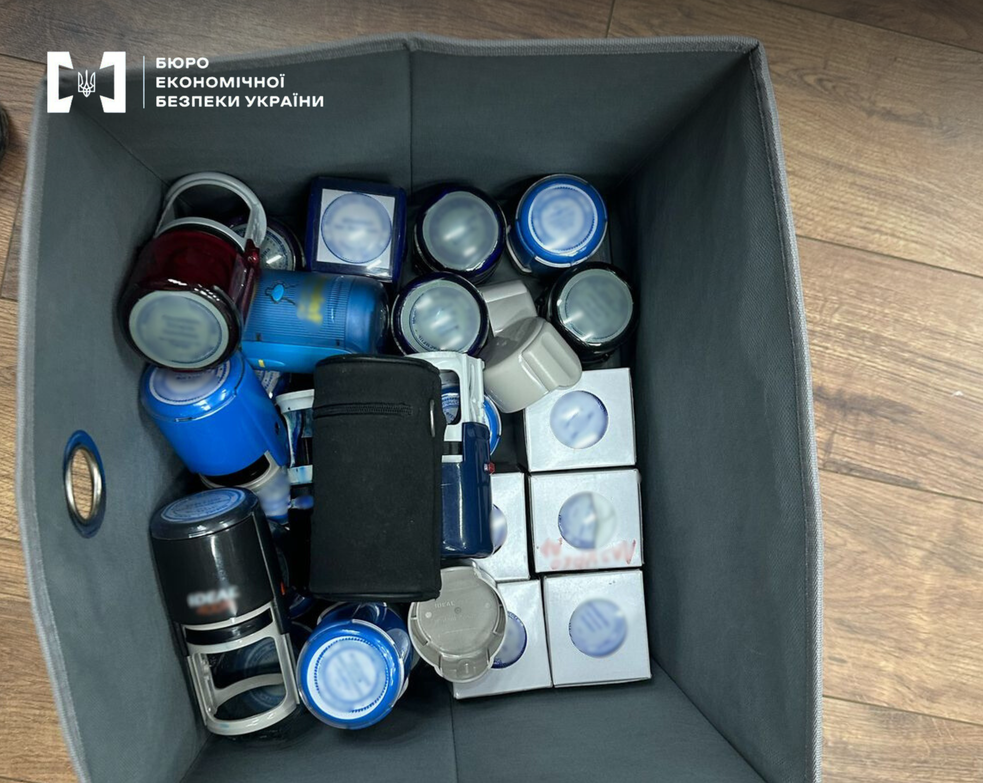 Close-up of many seals in a gray box.